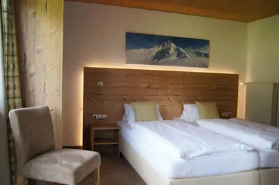 Ein Bett oder Betten in einem Zimmer der Unterkunft Pension Hohe Salve