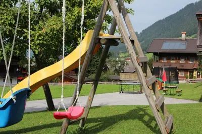 Ein Kinderspielbereich in der Unterkunft Appartements Moahof Zuhaus