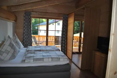 Ein Bett oder Betten in einem Zimmer der Unterkunft Chalet Karin