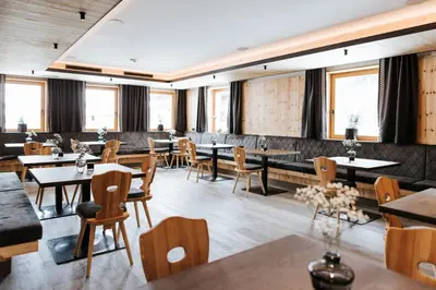 Ein Sitzbereich in der Unterkunft Hotel Thurnerhof