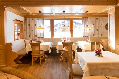 Ein Sitzbereich in der Unterkunft Der Berghof