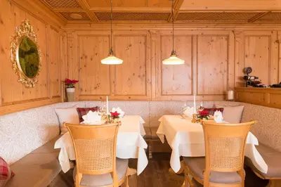 Ein Sitzbereich in der Unterkunft Der Berghof