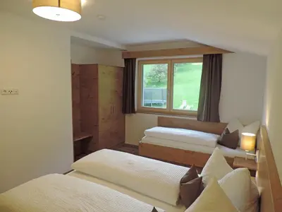 Ein Bett oder Betten in einem Zimmer der Unterkunft Ritzerhof Apartments