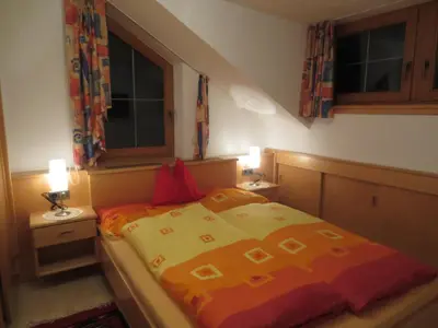 Ein Bett oder Betten in einem Zimmer der Unterkunft Apartments Penz