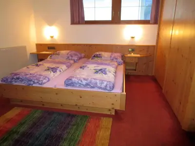 Ein Bett oder Betten in einem Zimmer der Unterkunft Apartments Penz
