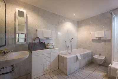 Ein Badezimmer in der Unterkunft Apparthotel Tom Sojer