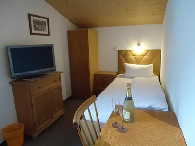 Ein Bett oder Betten in einem Zimmer der Unterkunft Gästehaus Birkenheim