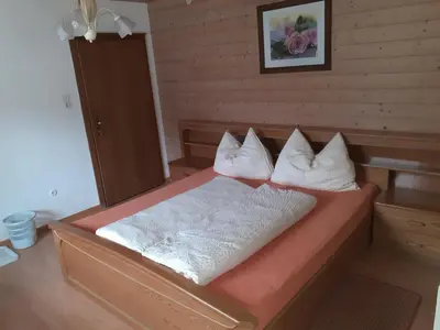 Ein Bett oder Betten in einem Zimmer der Unterkunft Gästehaus Birkenheim