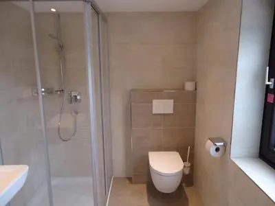 Ein Badezimmer in der Unterkunft Gästehaus Birkenheim