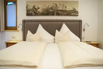 Ein Bett oder Betten in einem Zimmer der Unterkunft Hirzinger Marlis