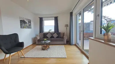 Ein Sitzbereich in der Unterkunft Panorama Appartements Filzerhof