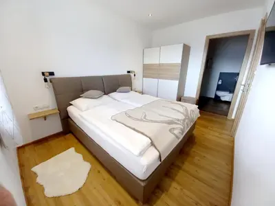 Ein Bett oder Betten in einem Zimmer der Unterkunft Panorama Appartements Filzerhof