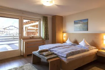 Ein Bett oder Betten in einem Zimmer der Unterkunft Ferienhaus Pfister