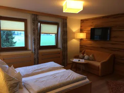 Ein Bett oder Betten in einem Zimmer der Unterkunft Ferienhaus Pfister