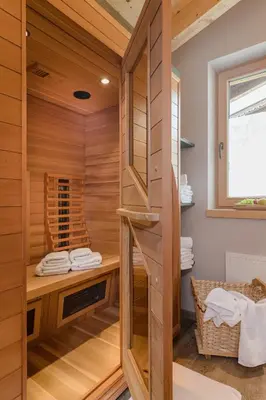 Ein Bett oder Betten in einem Zimmer der Unterkunft Zillertaler Hofchalets