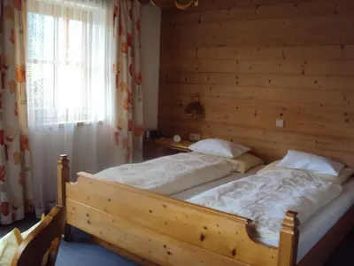 Ein Bett oder Betten in einem Zimmer der Unterkunft Haus Postfeld