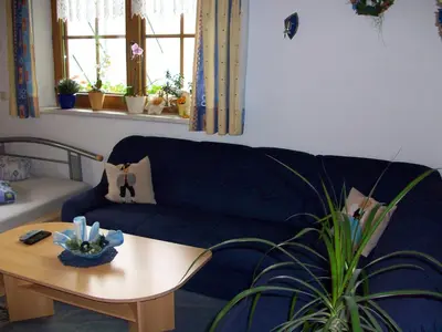 Ein Sitzbereich in der Unterkunft Gästehaus Flörl