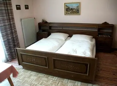 Ein Bett oder Betten in einem Zimmer der Unterkunft Pension Stubachblick