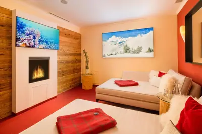 Ein Bett oder Betten in einem Zimmer der Unterkunft Gästehaus Edelweiss