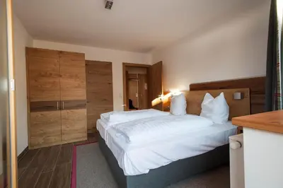 Ein Bett oder Betten in einem Zimmer der Unterkunft Appartementhaus Spiegl by Travel Partner