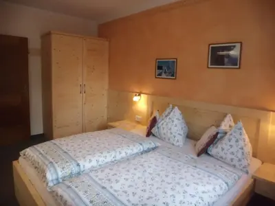 Ein Bett oder Betten in einem Zimmer der Unterkunft Haus Rohregger