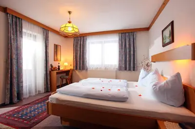 Ein Bett oder Betten in einem Zimmer der Unterkunft Frühstückspension Tannenhof