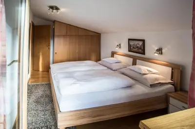 Ein Bett oder Betten in einem Zimmer der Unterkunft Frühstückspension Tannenhof