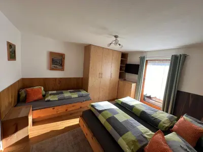 Ein Bett oder Betten in einem Zimmer der Unterkunft Ferienwohnungen Unterfeld