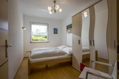 Ein Bett oder Betten in einem Zimmer der Unterkunft Ferienwohnung Karakas