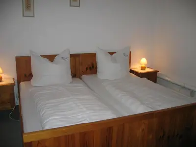 Ein Bett oder Betten in einem Zimmer der Unterkunft Haus Anne