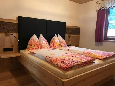 Ein Bett oder Betten in einem Zimmer der Unterkunft Landhaus Höllwarth