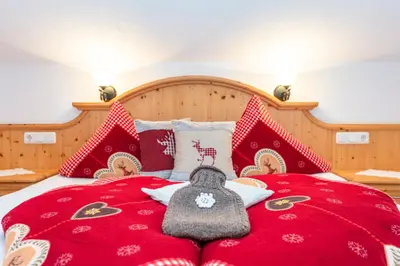 Ein Bett oder Betten in einem Zimmer der Unterkunft Ferienwohnungen Behamhof