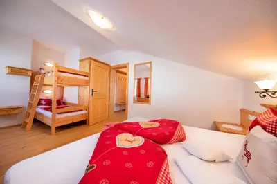 Ein Bett oder Betten in einem Zimmer der Unterkunft Ferienwohnungen Behamhof