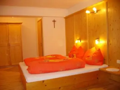 Ein Bett oder Betten in einem Zimmer der Unterkunft Komfortzimmer Widauer