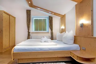 Ein Bett oder Betten in einem Zimmer der Unterkunft Gasthof Hotel Schermer