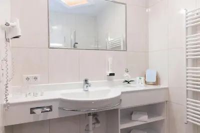 Ein Badezimmer in der Unterkunft Gasthof Hotel Schermer