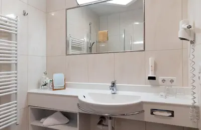 Ein Badezimmer in der Unterkunft Gasthof Hotel Schermer