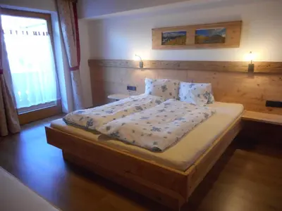 Ein Bett oder Betten in einem Zimmer der Unterkunft Apart Tiefenbach