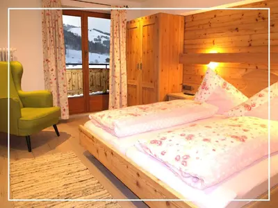 Ein Bett oder Betten in einem Zimmer der Unterkunft Mein TYROLapart im Zentrum vom Wilden Kaiser