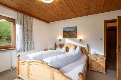 Ein Bett oder Betten in einem Zimmer der Unterkunft Ferienhaus Am Steindl 