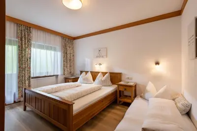 Ein Bett oder Betten in einem Zimmer der Unterkunft Ferienhaus Am Steindl 
