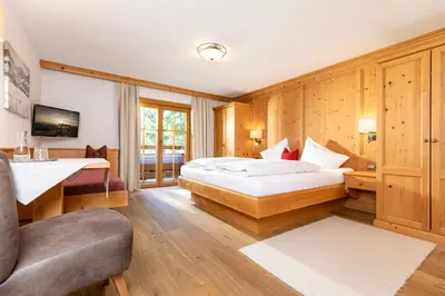 Ein Bett oder Betten in einem Zimmer der Unterkunft Gästehaus Gratlspitz