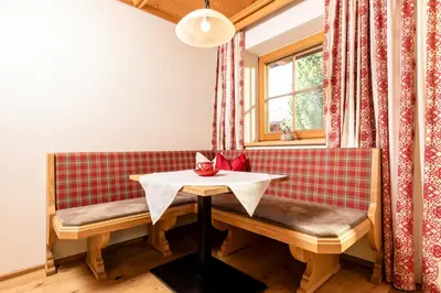 Ein Sitzbereich in der Unterkunft Gästehaus Gratlspitz
