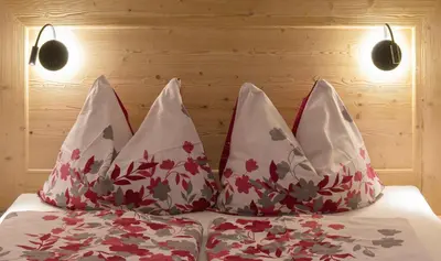 Ein Bett oder Betten in einem Zimmer der Unterkunft Bauernhof Glanzern