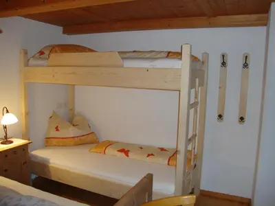 Ein Bett oder Betten in einem Zimmer der Unterkunft Ferienwohnung Nussbaum