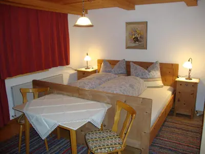 Ein Bett oder Betten in einem Zimmer der Unterkunft Ferienwohnung Nussbaum