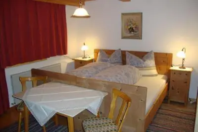 Ein Bett oder Betten in einem Zimmer der Unterkunft Ferienwohnung Nussbaum