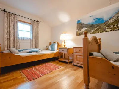 Ein Bett oder Betten in einem Zimmer der Unterkunft Holiday Home Alte Sahnealm by Interhome