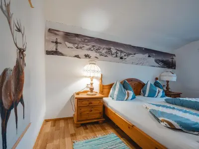 Ein Bett oder Betten in einem Zimmer der Unterkunft Holiday Home Alte Sahnealm by Interhome