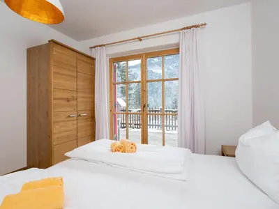 Ein Bett oder Betten in einem Zimmer der Unterkunft Chalet in Wald near Wildkogel Ski Arena